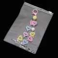 Colorful heart-shaped bead keychain set in a transparent PVC zipper storage bag - 13x19cm (10 Pieces/Pack) / Clear
