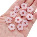 Pale pink flower-shaped glass beads for DIY jewelry making held in palm for size scale - 16mm (Hole 4.5mm) - 1 Piece/Pack / Pink