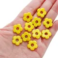 Handheld view of 16mm yellow flower glass beads with large holes for DIY jewelry - 16mm (Hole 4.5mm) - 1 Piece/Pack / Yellow