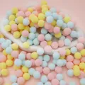 Pastel macaron color decorative plush pom poms in pink, yellow and blue for DIY crafts - 100pcs Pack / 1.5cm / Light Mixed Theme