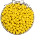 Vibrant yellow round wooden beads for DIY bracelets in a vintage silver decorative tray - Spring Light Yellow