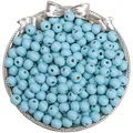 Light blue 8-10mm round wooden beads with matte finish for DIY jewelry crafts - Spring Light Blue