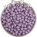 Vibrant purple round wooden beads in a silver bow tray for DIY jewelry making - Spring Light Purple