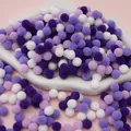 Colorful purple and white polyester pom poms in a white tray for DIY crafts - Pack of 200 / 1cm / Purple Series