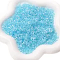 Sky blue aurora cat-eye glass seed beads 4mm in a white star-shaped ceramic tray - 4mm (10g/Pack) / Sky Blue