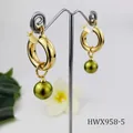 Detail of vintage 18K gold earrings featuring olive green pearls on a white stand - Olive Green Pearl Style (HWX958-5)