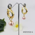 Detailed macro view of 18K gold plated hoop earrings with natural shell pearls - Light Pink Pearl Style (HWX958-6)