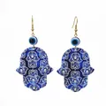 Detailed view of Hamsa Hand and Evil Eye acrylic earrings with intricate mandala patterns - Multiple Blue Hamsa