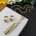 Detail view of hollow gold turtle pattern jewelry set with shiny shell pearl and chain - Golden Pearl(HWNX9439-7)