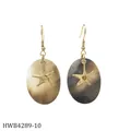 Detail view of tropical oval shell earrings with gold starfish charms for a beach style - Starfish and Heart Style (HWB4289-10)