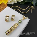 Detailed view of hollow floral pattern golden necklace and earrings set with green bead - Green Bead(HWNX9439-17)