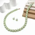 Minzgrünes 12mm Perlen-Schmuckset mit Halskette und Ohrsteckern in Goldoptik für Damen - Minzgrün (HWNX9179-3)