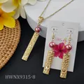 Detailed view of Hawaiian style jewelry set with floral engraving and purple pearls - Pink Purple Style (HWNX9315-8)