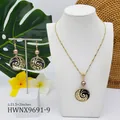 Detailed set of wavy drop oil jewelry with pearls on white display for island vibes - Coffee Brown Pearl Style (HWNX9691-9)