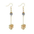 Minimalist gold monstera leaf earrings with mother of pearl beads and long chain drop - Hollow Monstera Leaf