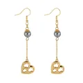 Detailed close-up of gold heart drop earrings with shell pearls and turtle cutout motifs - Heart Hollow Turtle