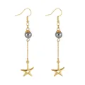 Detail of gold star pendant with heart cutout and dark grey pearl on dangle earrings - Heart Hollow Starfish