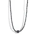 Detail of dark beaded necklace featuring a large iridescent shell pearl and gold accents - Dark Gray Beads Iridescent Shell Pearl (Style 8)