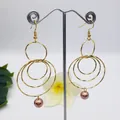 Exaggerated golden multi-circle earrings with natural pearl drop on white background - Gold / Brownish Red (HWX814-2)