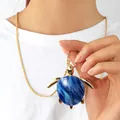 Goldene Schildkröten-Halskette mit dunkelblauer Marmorharz-Schale auf eleganter Kordelkette - Blau Weiß Schildkröte Halskette (HWNX9682N-5)