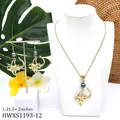 Parure de bijoux fleur tropicale dorée avec perles sombres, collier et boucles - Style Perle Gris Foncé Fleur Tropicale (HWXS1193-12)