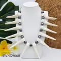 Collier tribal avec perles et pendentif corne pour un style d'été tropical chic - Style Corne Ivoire (HWNX9660)