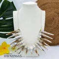 Détail du collier tribal avec pendentifs en corne et chaîne dorée de 25 pouces - Style Corne Effet Marbre (HWNX9665)