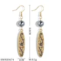 Long gold dangle earrings with grey pearls and floral engraved surfboard pendants - Vintage Floral Carved Style (HWNX9674)