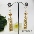 Champagne pearl and hollow clover bar earrings in gold plating on a jewelry stand - Champagne Pearl Style (HWX971-7)
