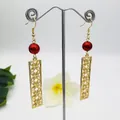Gold hollow clover earrings with red pearl details in a vintage bohemian style - Red Pearl Style (HWX971-23)