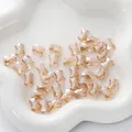 Amber faceted bow-shaped glass beads for handmade DIY jewelry on a white dish - Bow Shape / 10x8mm (10 Pieces/Pack) / Champagne Gold