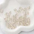 Champagne faceted glass beads in a white ceramic tray for DIY jewelry making - Bow Shape / 10x8mm (10 Pieces/Pack) / Beige
