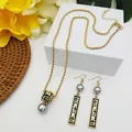 Golden Samoa totem jewelry set with black enamel detail and grey pearls - Grey (HWNX9641-11)