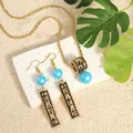 Hawaiian Samoa totem jewelry set with black enamel, gold finish, and blue pearl accents - Light Blue (HWNX9641-21)