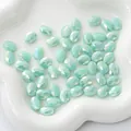 Mint green faceted oval acrylic beads with AB iridescent finish for DIY jewelry - Flat Oval 8x11mm, Hole Approx 1mm, 10 Pieces/Pack / Solid Light Green