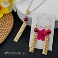 Hawaiian gold necklace and earrings set with red beads and floral rectangle charms - Red Shiny Bead Style (HWNX9318-23)