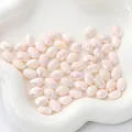 Faceted iridescent light pink oval crystal beads for DIY jewelry making and necklaces - Flat Oval 8x11mm, Hole Approx 1mm, 10 Pieces/Pack / Solid Nude Pink