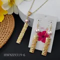 Golden Hawaiian floral necklace and earring set with pink pearls and rectangular charms - Round Pink Pearl (HWNX9319-6)
