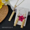 Hawaiian gold frangipani necklace and earrings set with dark pearls and shell detail - Dark Coffee Pearl Gold Bar (HWNX9320-9)