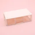 Close-up of a minimalist desktop storage box with clear plastic drawers on pink backdrop - White / 14.5x8.8x4.5cm