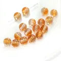 Sparkly orange resin round beads with gold glitter for DIY jewelry making - Orange