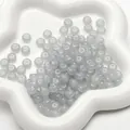 8x5mm light gray translucent glass abacus beads in a white ceramic star tray - Abacus Style / 25 Pieces/Pack (8x5mm) / Gray