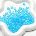 Light blue translucent frosted abacus beads in a star tray for DIY jewelry making - Dark Blue