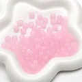 Pink semi-transparent 8x5mm glass abacus beads for DIY jewelry making in a star dish - Pink