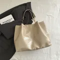 Beige large PU leather tote bag with gold chain strap and stitching detail - Khaki