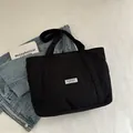Black corduroy tote bag with Fashion Instinct label for casual daily commute - Black