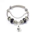 Detail of DIY stainless steel charm bracelet with black faceted beads and crown pendant - Black