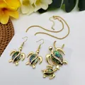 Gouden schildpad sieradenset met kleurrijke abalone schelp en witte strass steentjes - Goud
