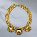 Detailed view of layered gold cuban chain necklace with amber zircon stone pendant - Amber Square Zirconia Rivet Style (PLN0850)
