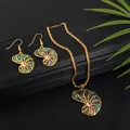 Macro detail of golden sunflower jewelry set with iridescent abalone shell inlays - Nautilus Conch Style (HWNX2715)